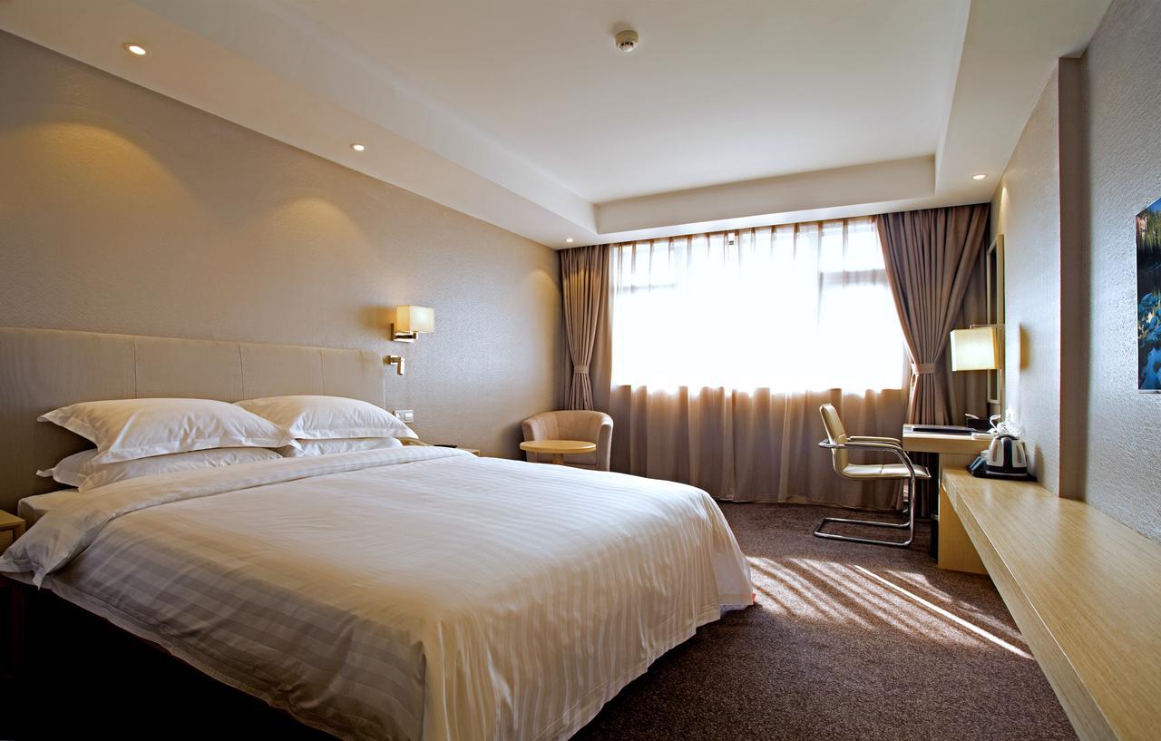 New Dynasty Hotel Кайфын Экстерьер фото
